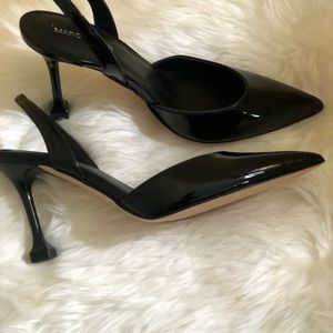 Black patent leather sling back shoes